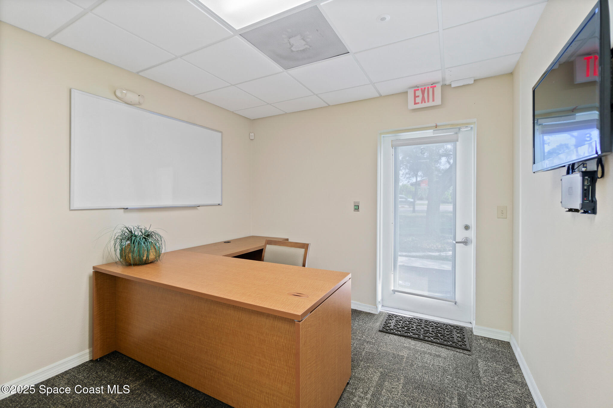 38 Suntree Place, Unit 2 Melbourne, FL 32940 - Photo 44 of 52 a room with storage and utility