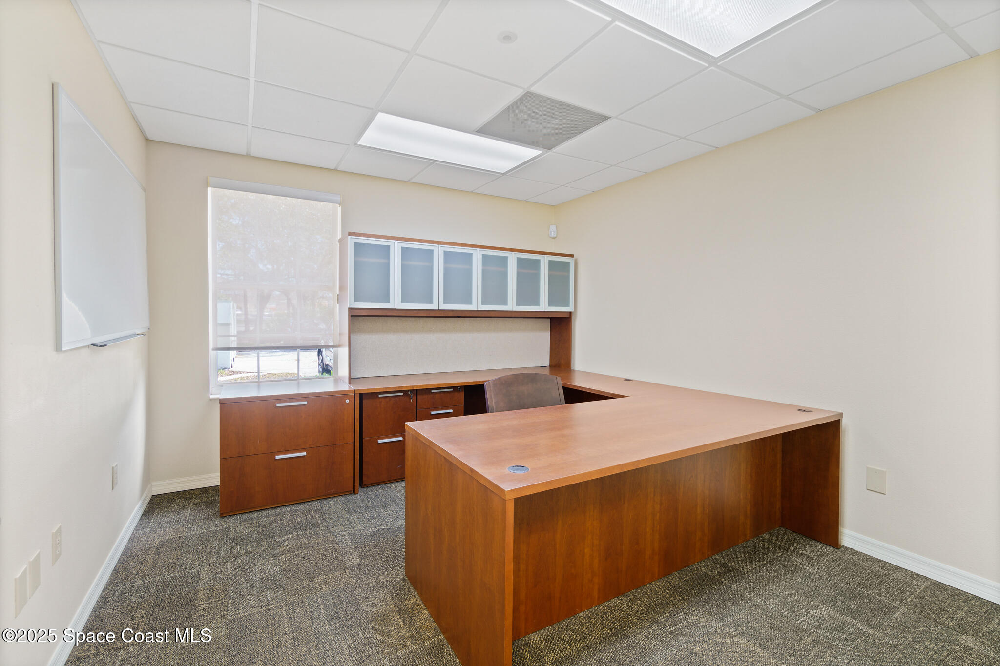 38 Suntree Place, Unit 2 Melbourne, FL 32940 - Photo 45 of 52 a room with storage and utility