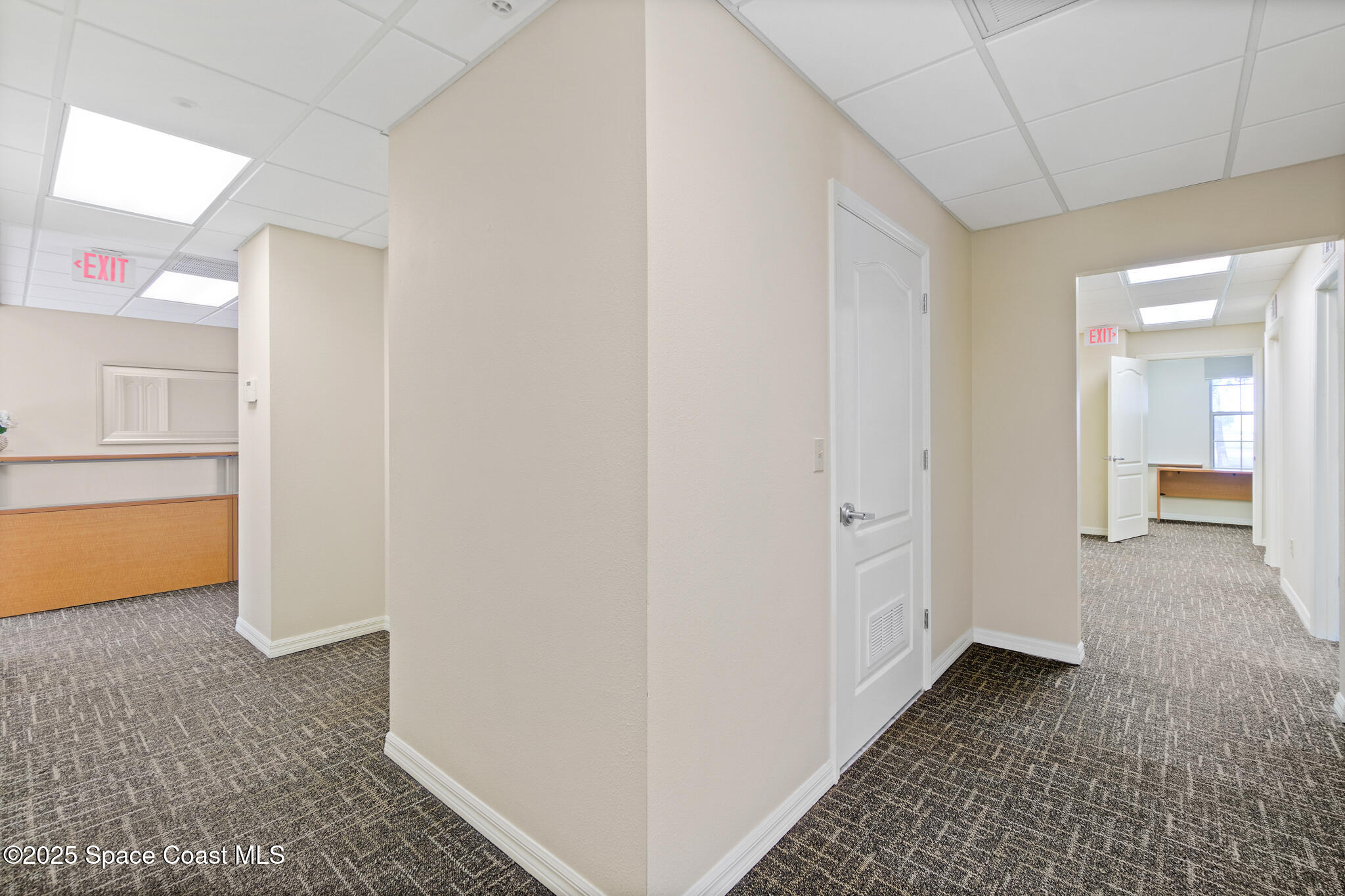 38 Suntree Place, Unit 2 Melbourne, FL 32940 - Photo 50 of 52 a view of hallway with closet and a bathroom