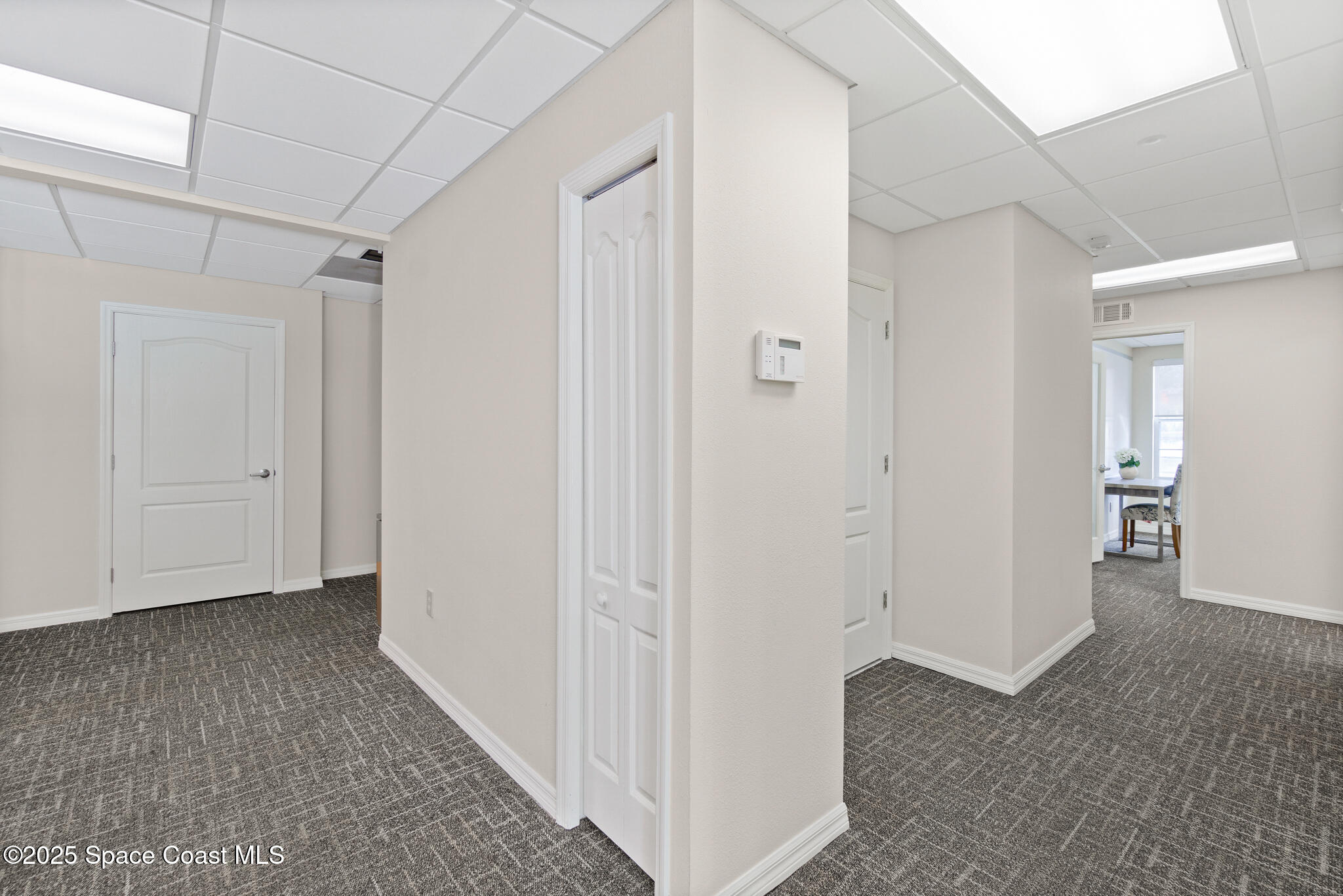 38 Suntree Place, Unit 2 Melbourne, FL 32940 - Photo 52 of 52 a view of hallway with closet