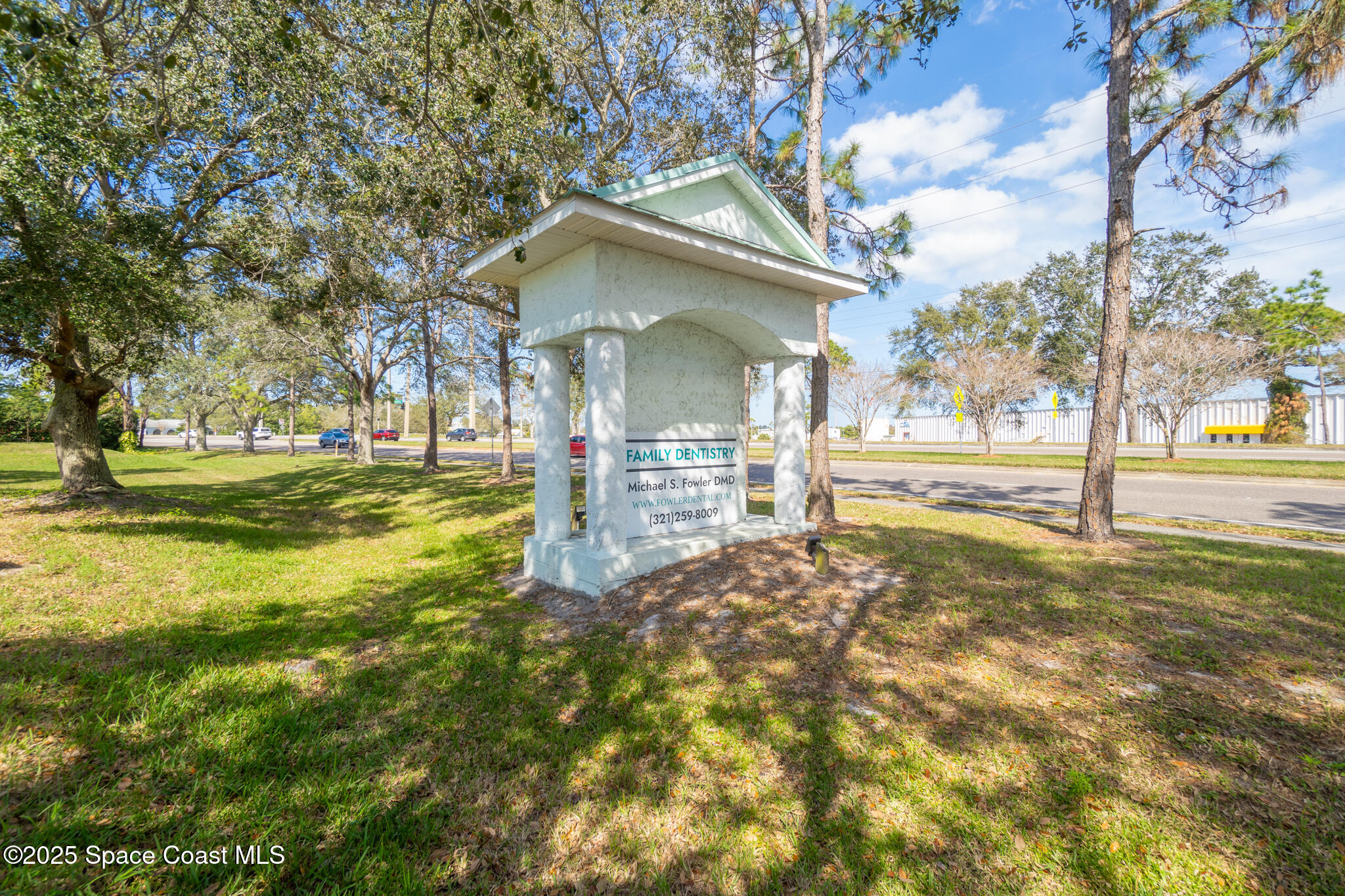 38 Suntree Place, Unit 2 Melbourne, FL 32940 - Photo 10 of 52 a view of a yard with plants and trees