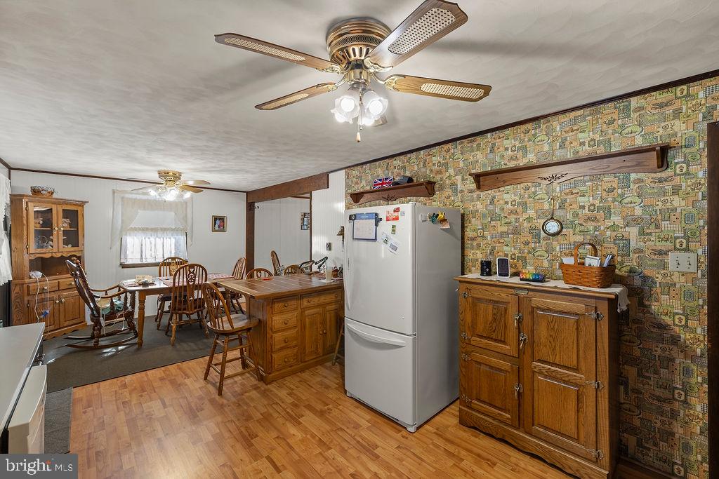 470 Racetrack Road Abbottstown, PA 17301 - Photo 11 of 54 a living room with furniture appliances and wooden floor