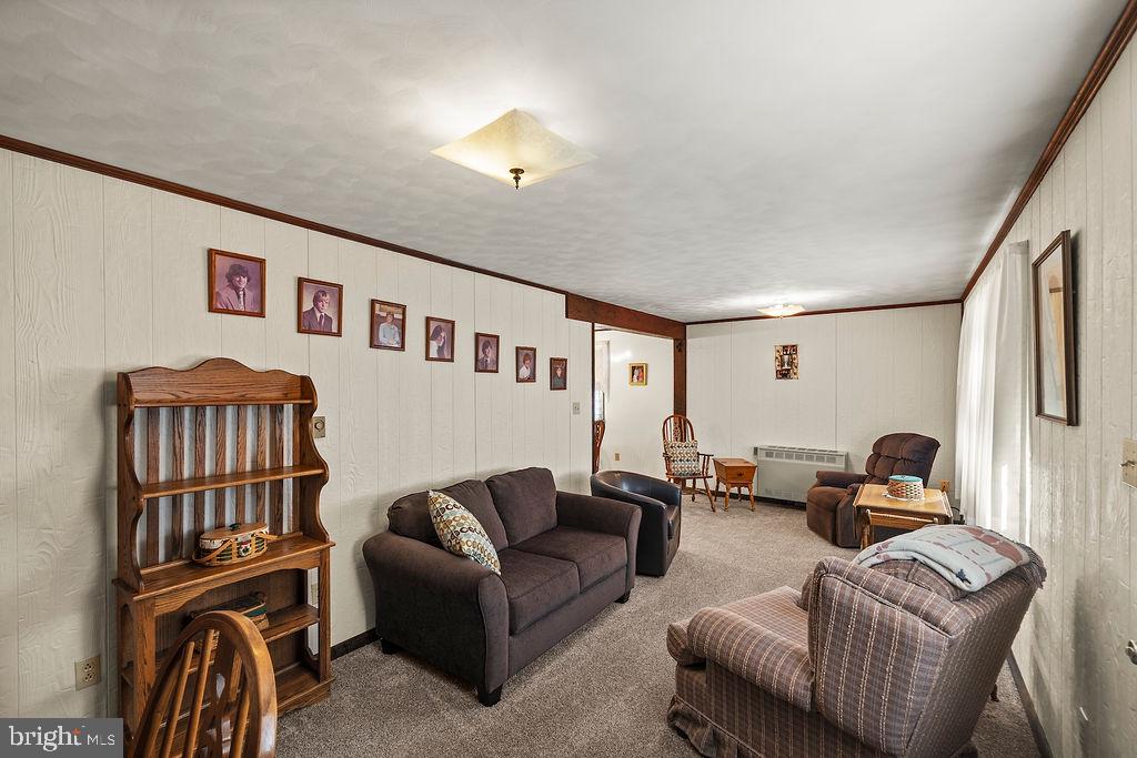 470 Racetrack Road Abbottstown, PA 17301 - Photo 14 of 54 a living room with furniture workspace and a window