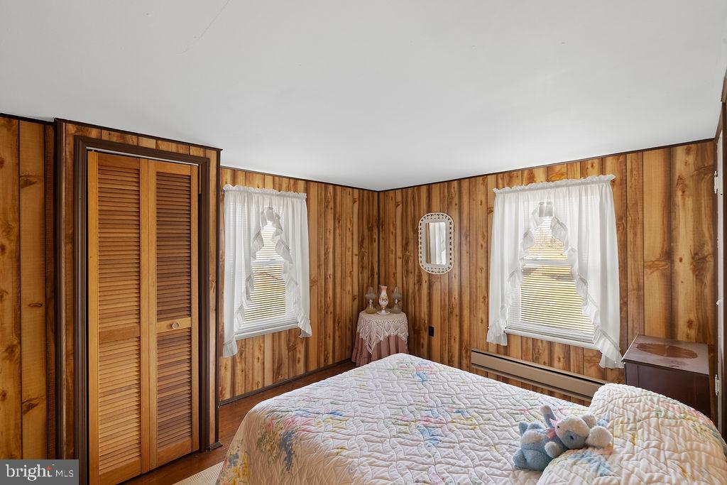 470 Racetrack Road Abbottstown, PA 17301 - Photo 28 of 54 a bedroom with a large bed and a large window