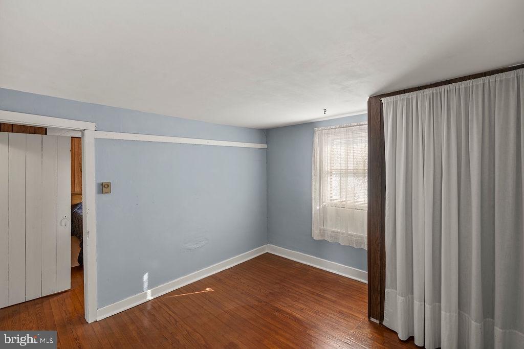 470 Racetrack Road Abbottstown, PA 17301 - Photo 31 of 54 a view of an empty room with wooden floor and a window