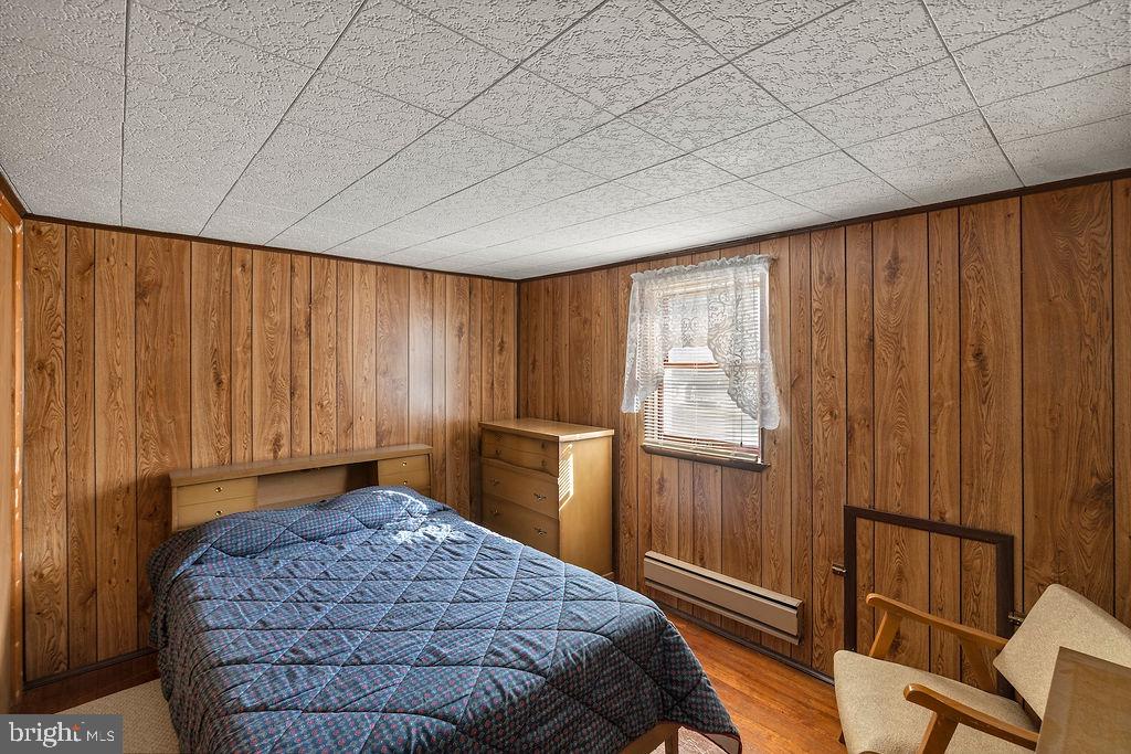 470 Racetrack Road Abbottstown, PA 17301 - Photo 32 of 54 a bedroom with a bed and a window