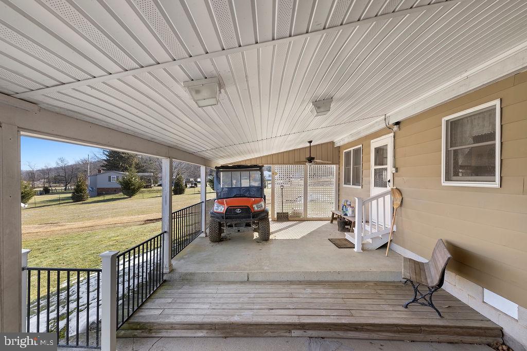 470 Racetrack Road Abbottstown, PA 17301 - Photo 4 of 54 a view of a porch with furniture