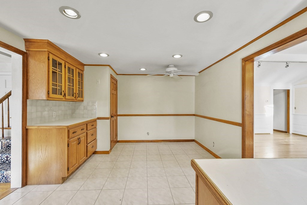72 Cambridge Road, Unit 2 Woburn, MA 01801 - Photo 15 of 30 a view of a kitchen with a sink and a refrigerator