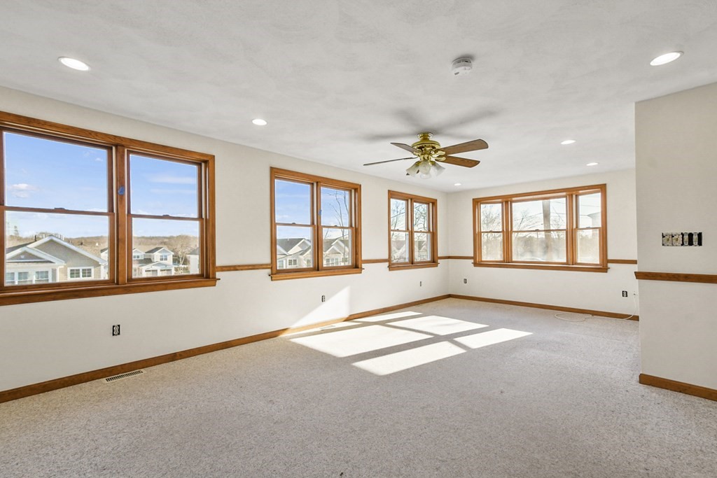 72 Cambridge Road, Unit 2 Woburn, MA 01801 - Photo 2 of 30 a view of an empty room with a window