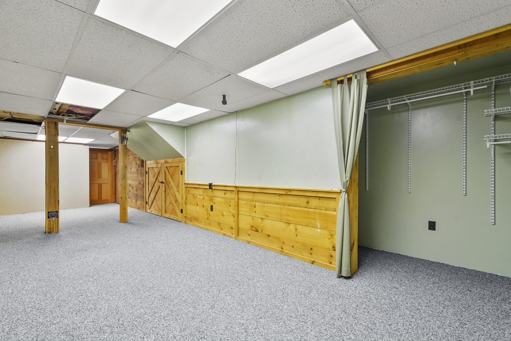 72 Cambridge Road, Unit 2 Woburn, MA 01801 - Photo 28 of 30 a view of an empty room with windows