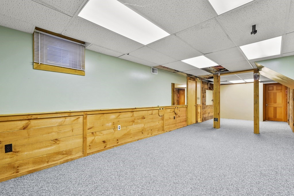 72 Cambridge Road, Unit 2 Woburn, MA 01801 - Photo 29 of 30 a view of an empty room with windows