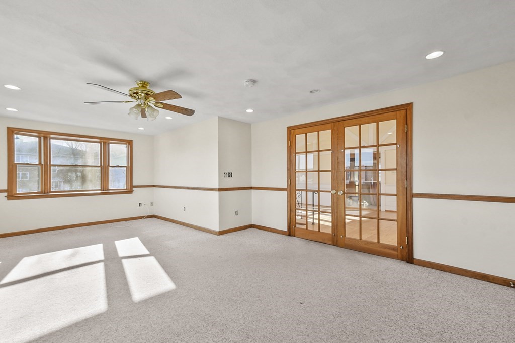 72 Cambridge Road, Unit 2 Woburn, MA 01801 - Photo 3 of 30 a view of an empty room with a window