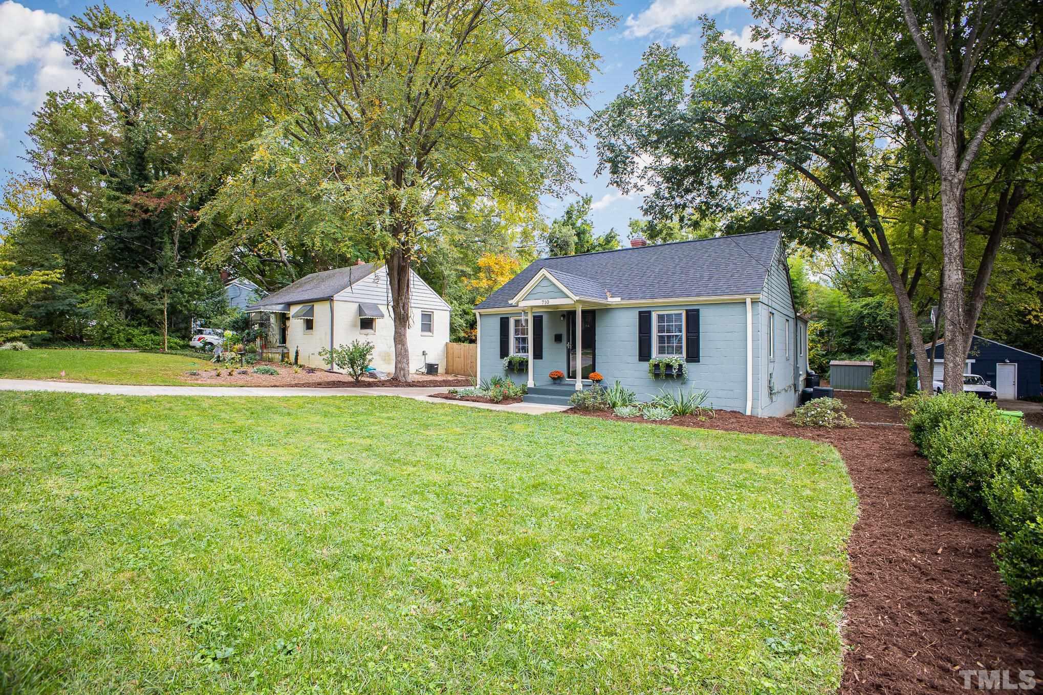 710 Tyler Road Raleigh, NC 27604 - Photo 21 of 27 a front view of a house with yard and green space