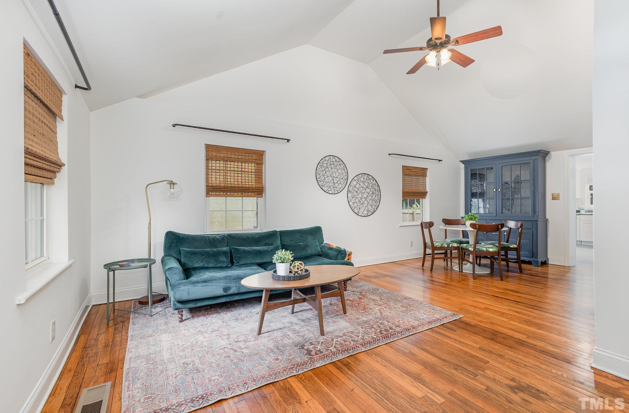 710 Tyler Road Raleigh, NC 27604 - Photo 4 of 27 a living room with furniture and wooden floor