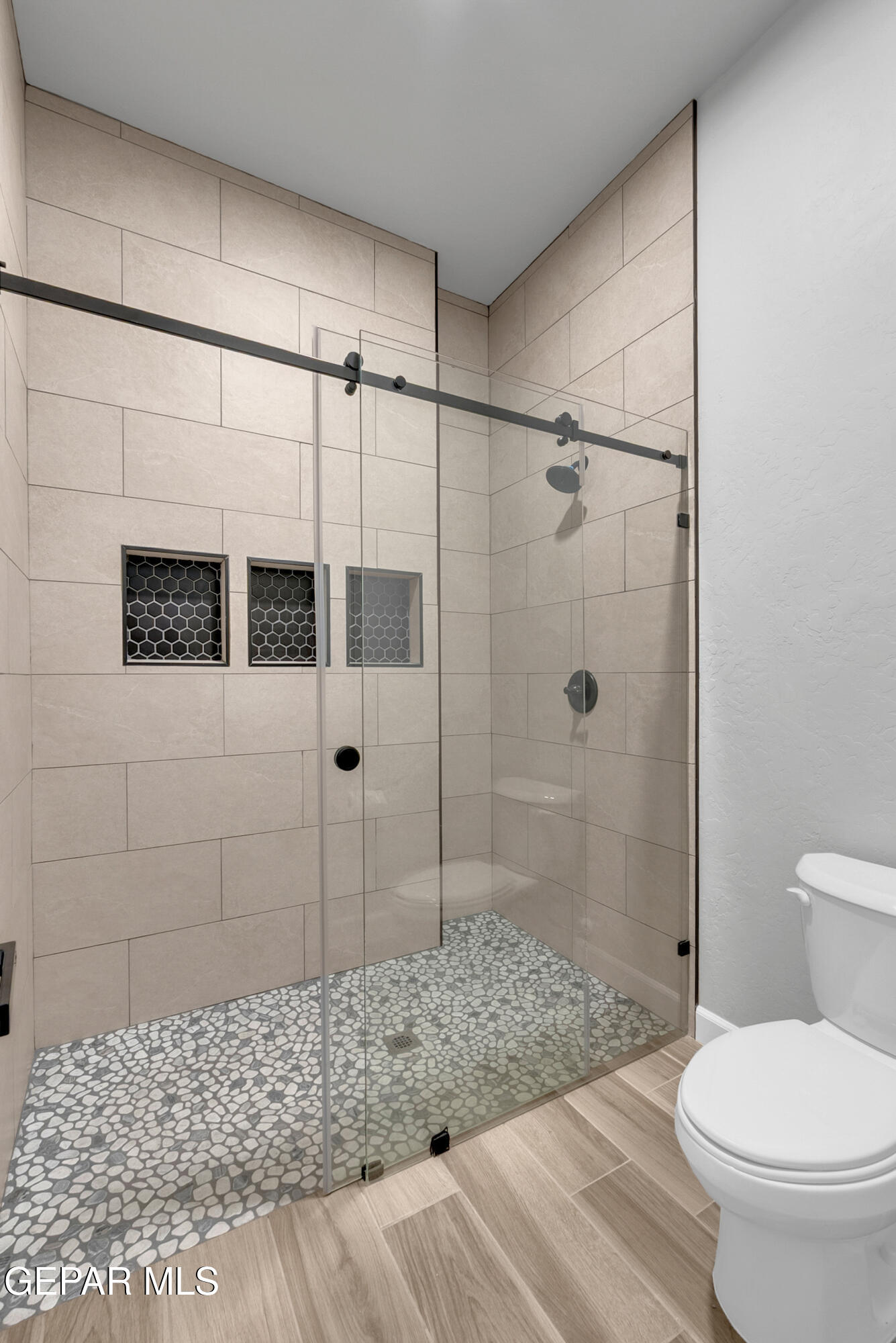 5612 Rio Bonito Circle El Paso, TX 79932 - Photo 18 of 79 a bathroom with a shower toilet and sink