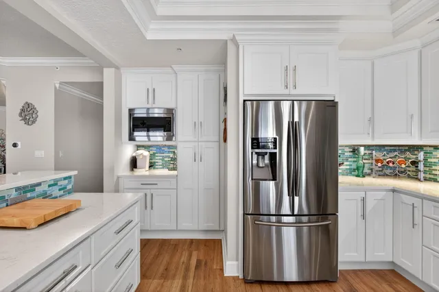 a view of a dining area with furniture window and wooden floor