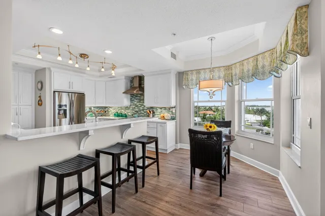 a view of a balcony with furniture