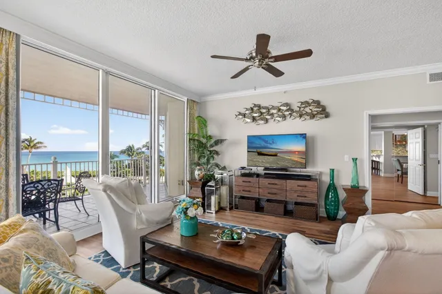 a bathroom with a bathtub shower sink mirror and toilet