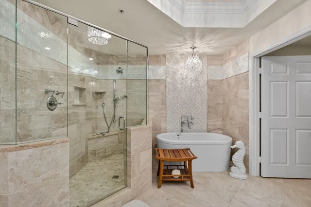 a bathroom with a sink toilet a mirror and shower