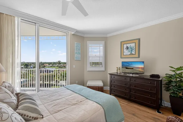 a bathroom with a sink mirror and toilet