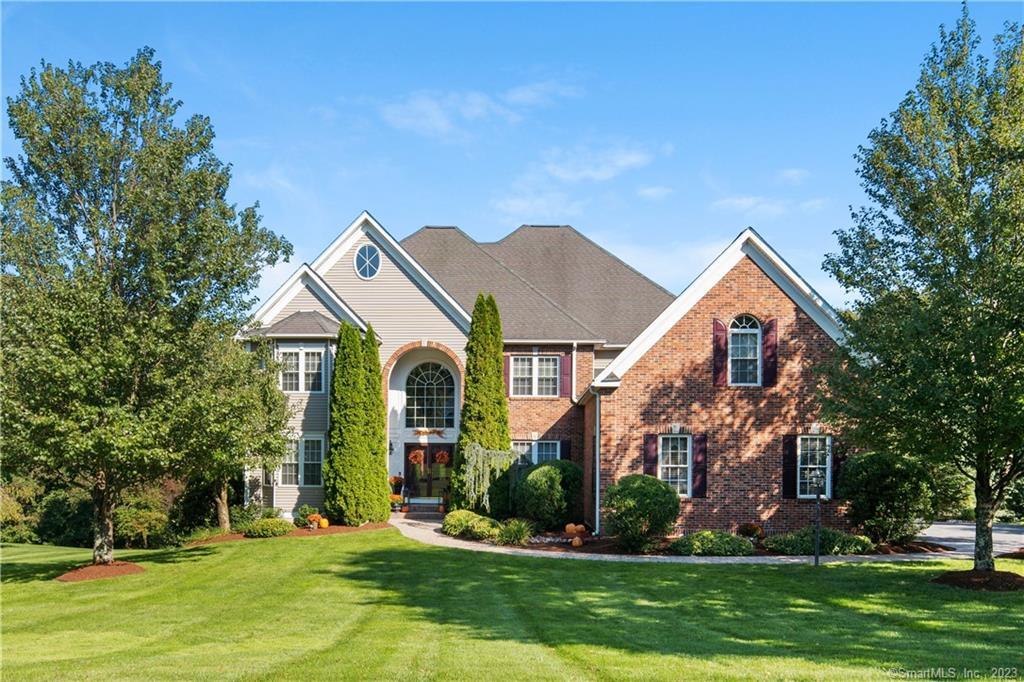 front view of house with a yard