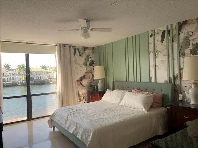 a bathroom with a sink and shower