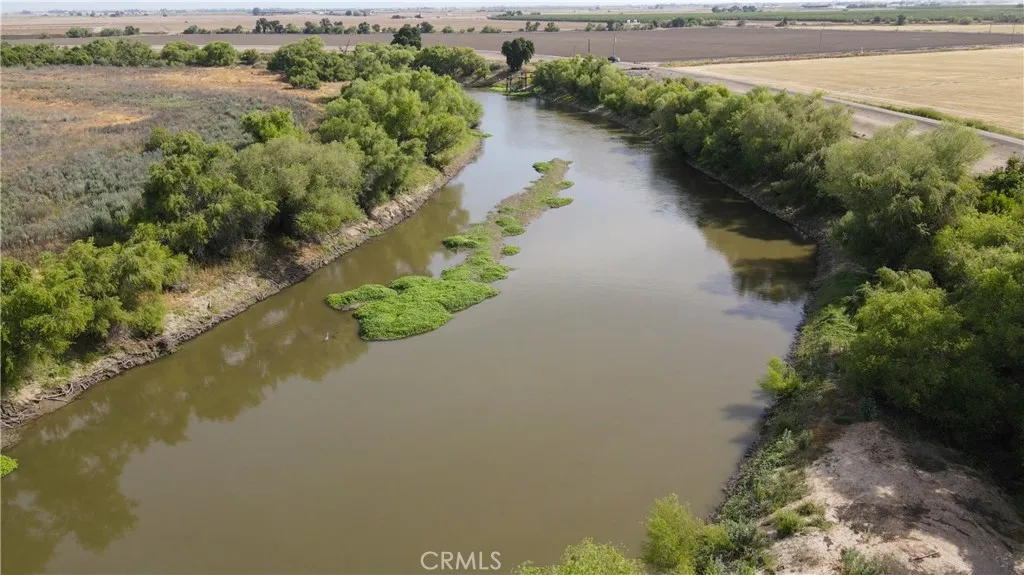 0 Hogin Turlock, CA 95382 - Photo 9 of 10 an aerial view of a house with a yard and lake view