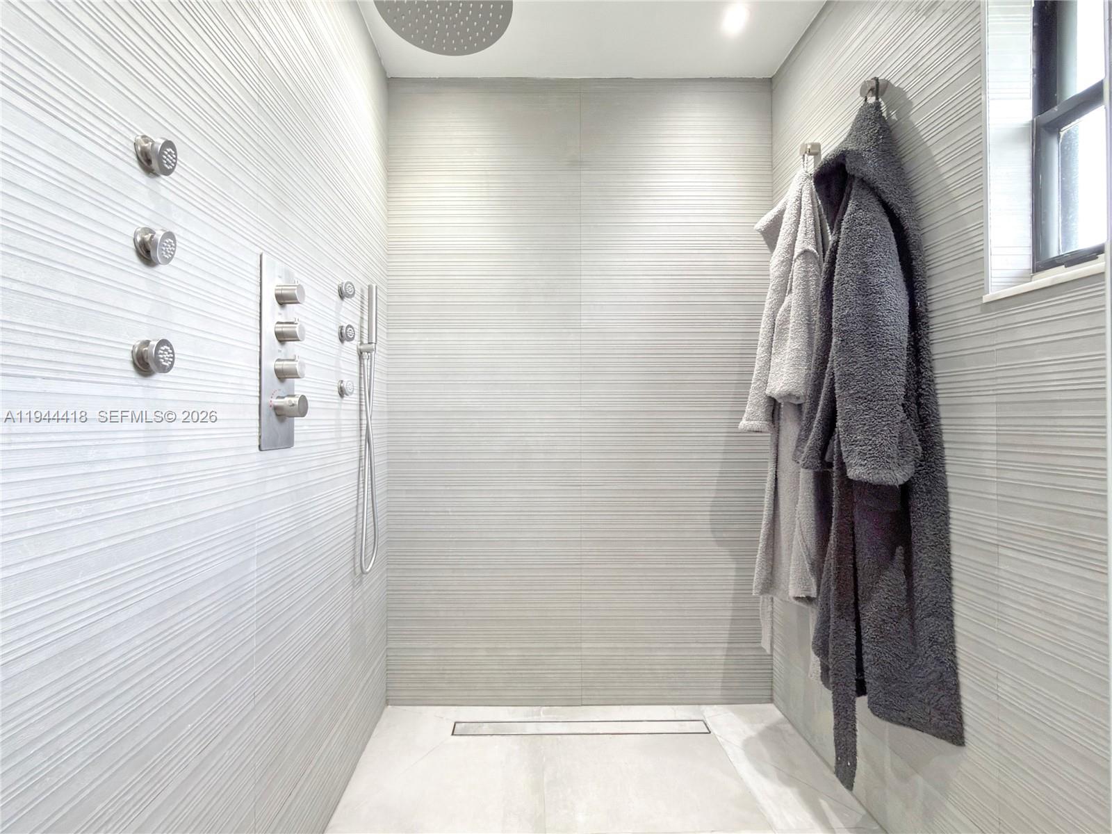 760 Windtree Way Wellington, FL 33414 - Photo 38 of 45 a bathroom with a shower