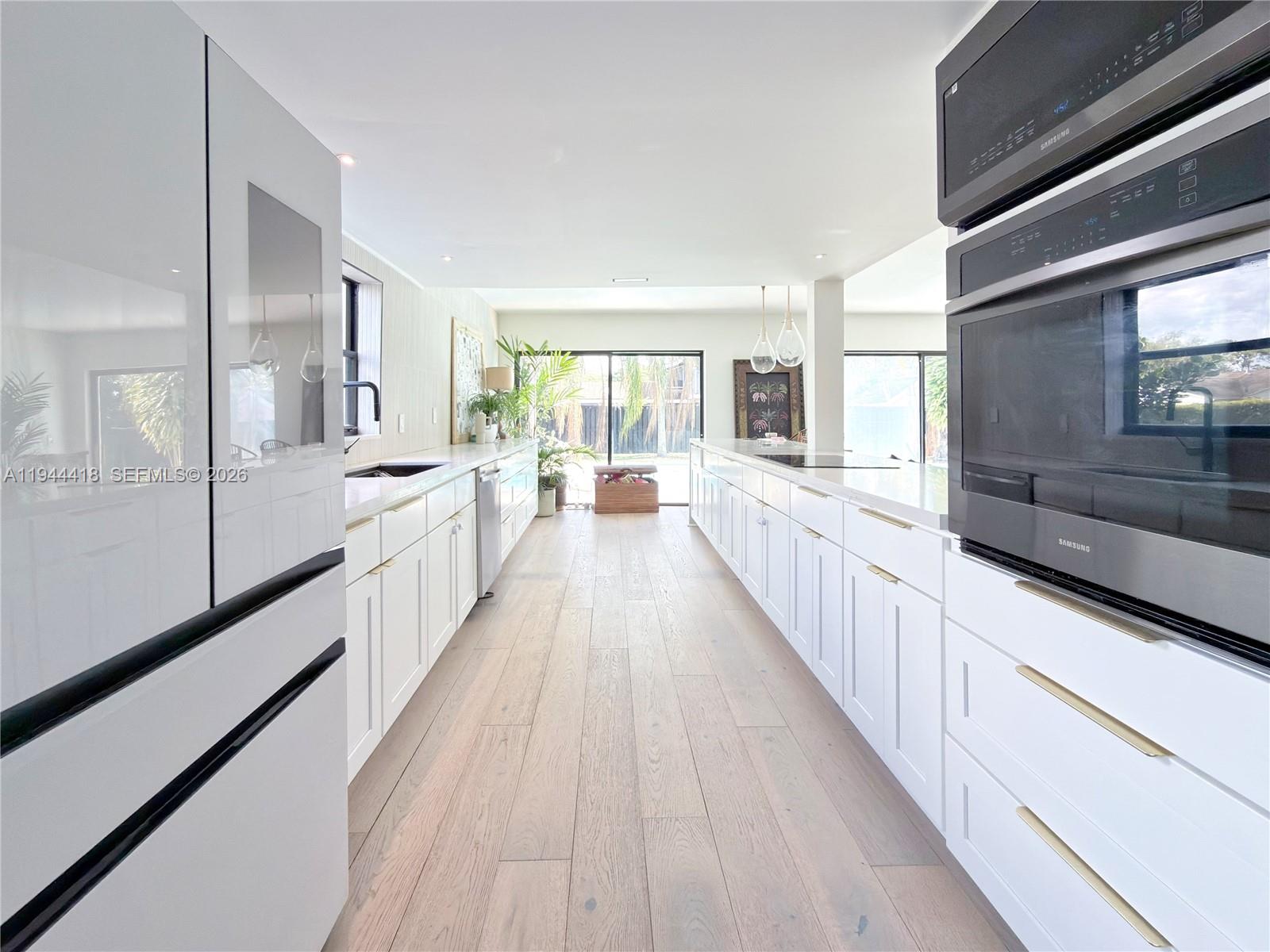 760 Windtree Way Wellington, FL 33414 - Photo 6 of 45 a view of a living room filled with furniture