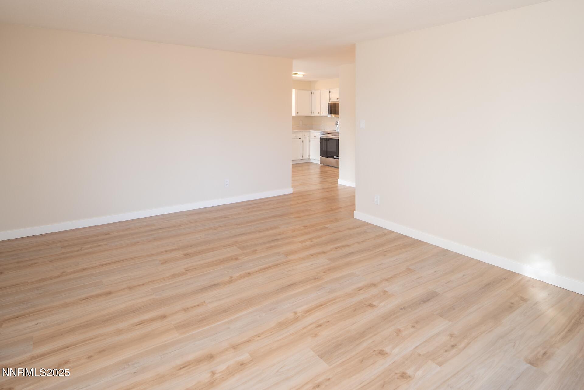 1605 Alamo Street Reno, NV 89503 - Photo 18 of 44 a view of empty room with wooden floor