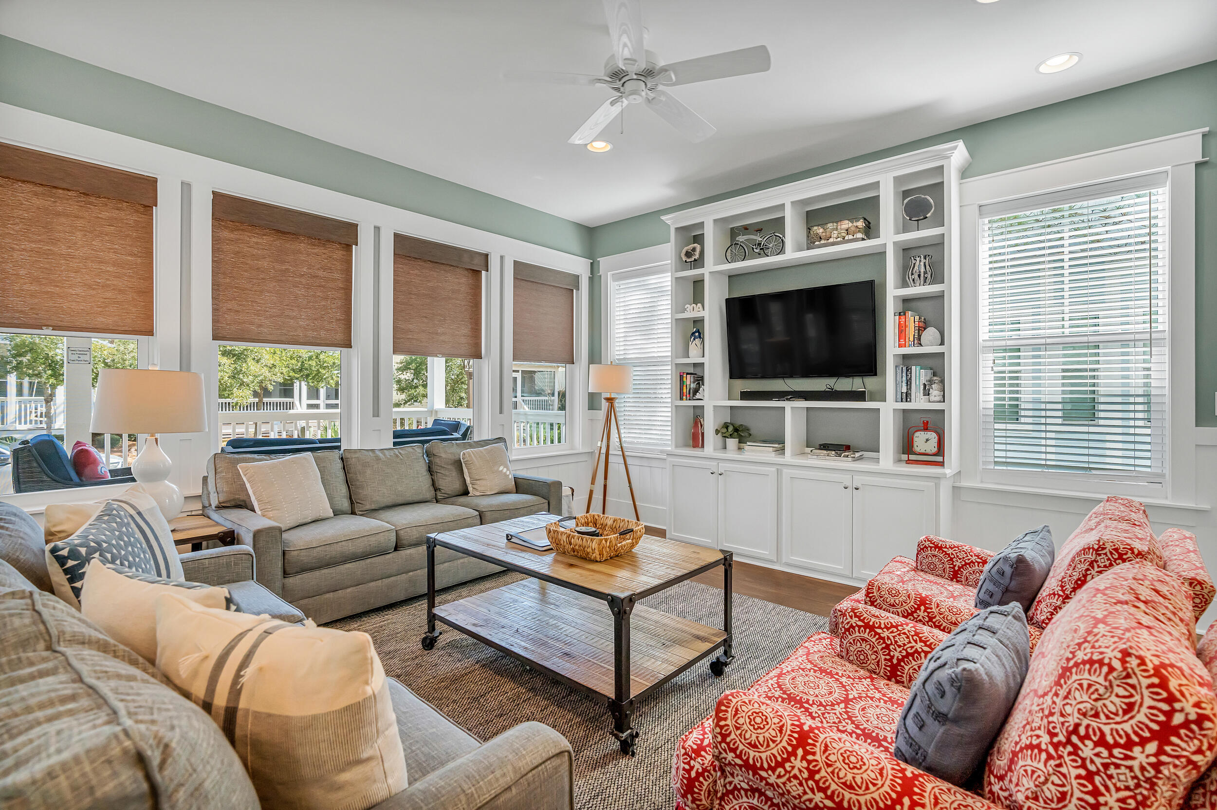 654 Flatwoods Forest Loop Santa Rosa Beach, FL 32459 - Photo 14 of 53 a living room with furniture and a flat screen tv