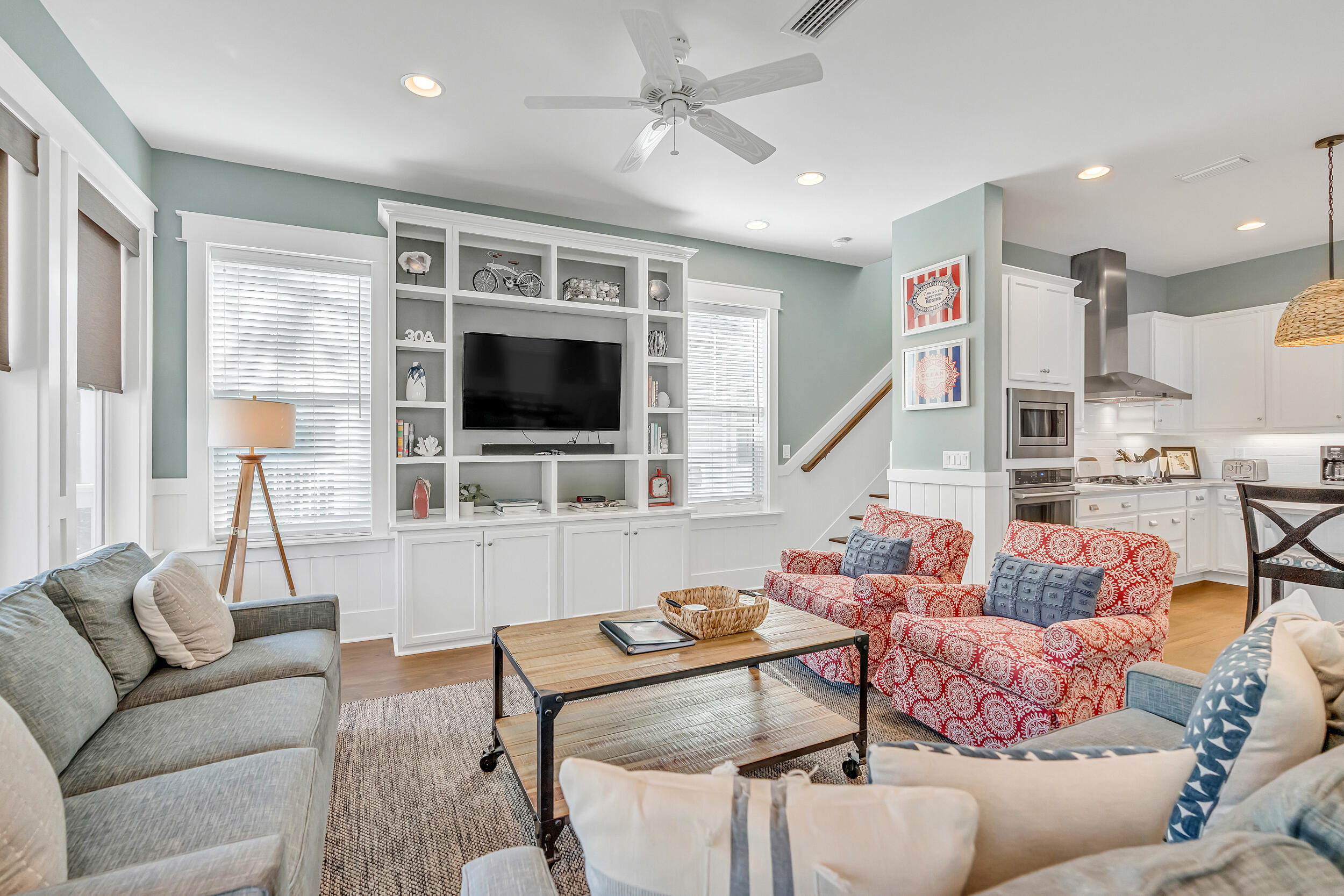 654 Flatwoods Forest Loop Santa Rosa Beach, FL 32459 - Photo 16 of 53 a living room with furniture and a flat screen tv