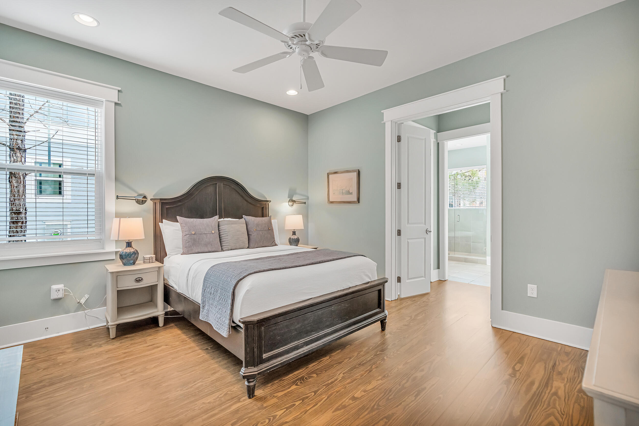 654 Flatwoods Forest Loop Santa Rosa Beach, FL 32459 - Photo 18 of 53 a bedroom with a bed and a chandelier