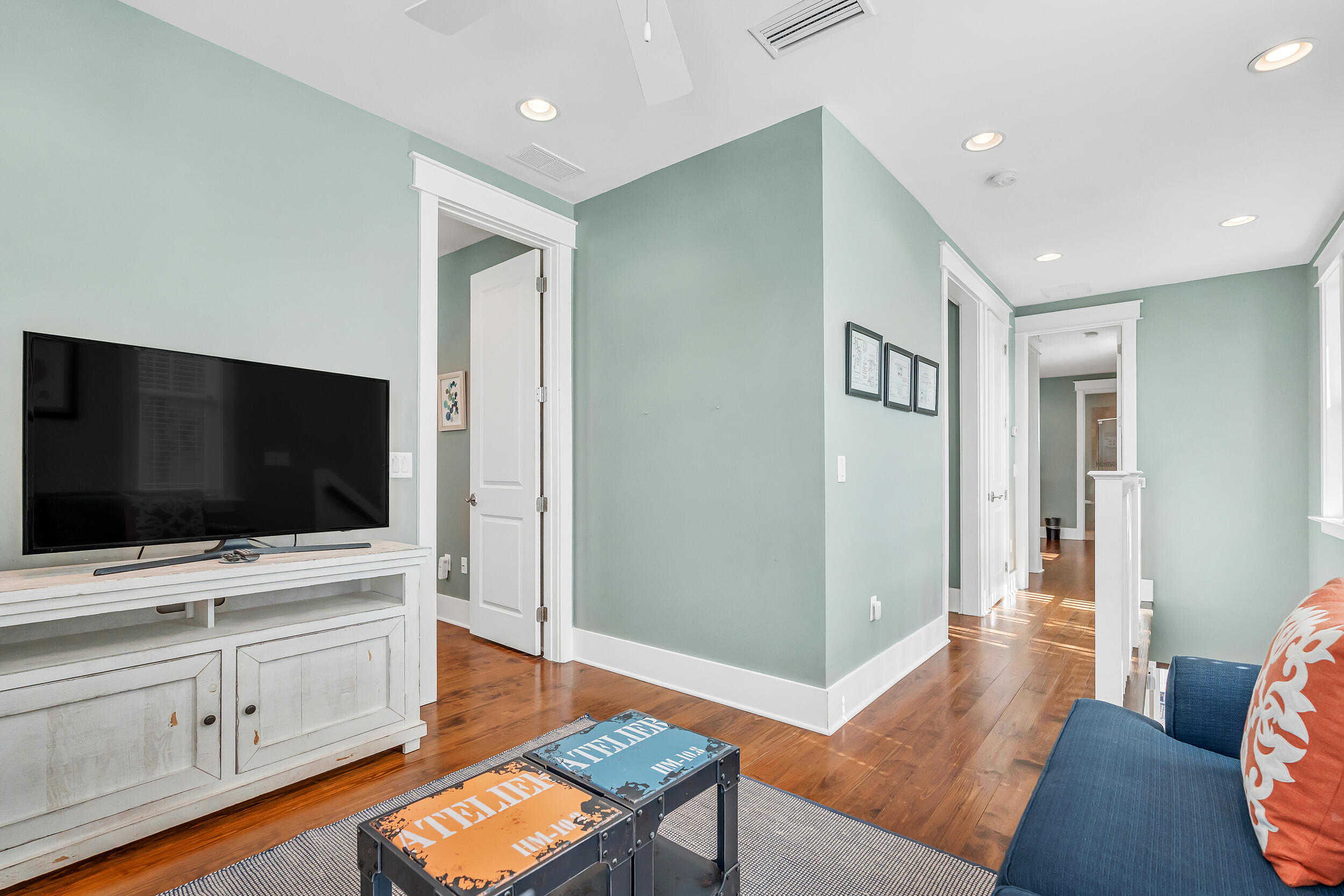 654 Flatwoods Forest Loop Santa Rosa Beach, FL 32459 - Photo 25 of 53 a living room with furniture and a flat screen tv