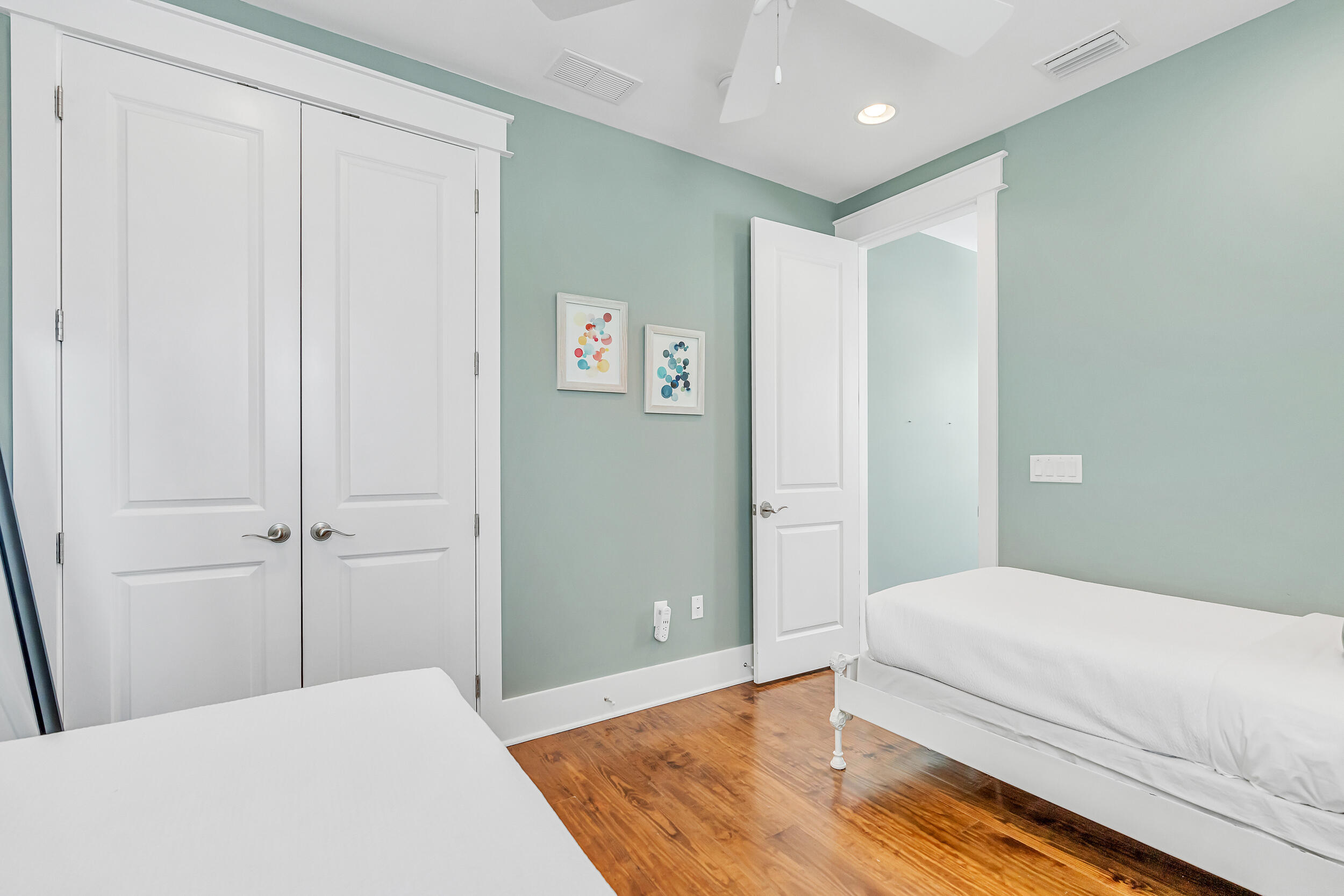 654 Flatwoods Forest Loop Santa Rosa Beach, FL 32459 - Photo 27 of 53 a bedroom with a bed and a painting on the wall