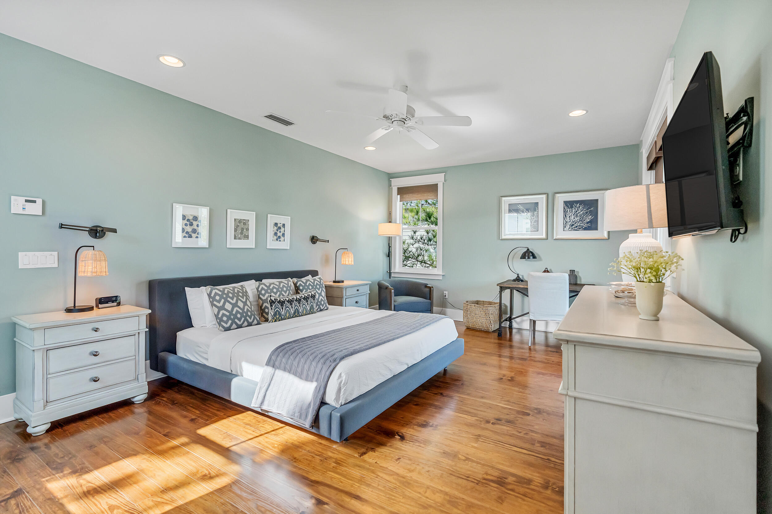 654 Flatwoods Forest Loop Santa Rosa Beach, FL 32459 - Photo 31 of 53 a bedroom with a large bed and a flat screen tv