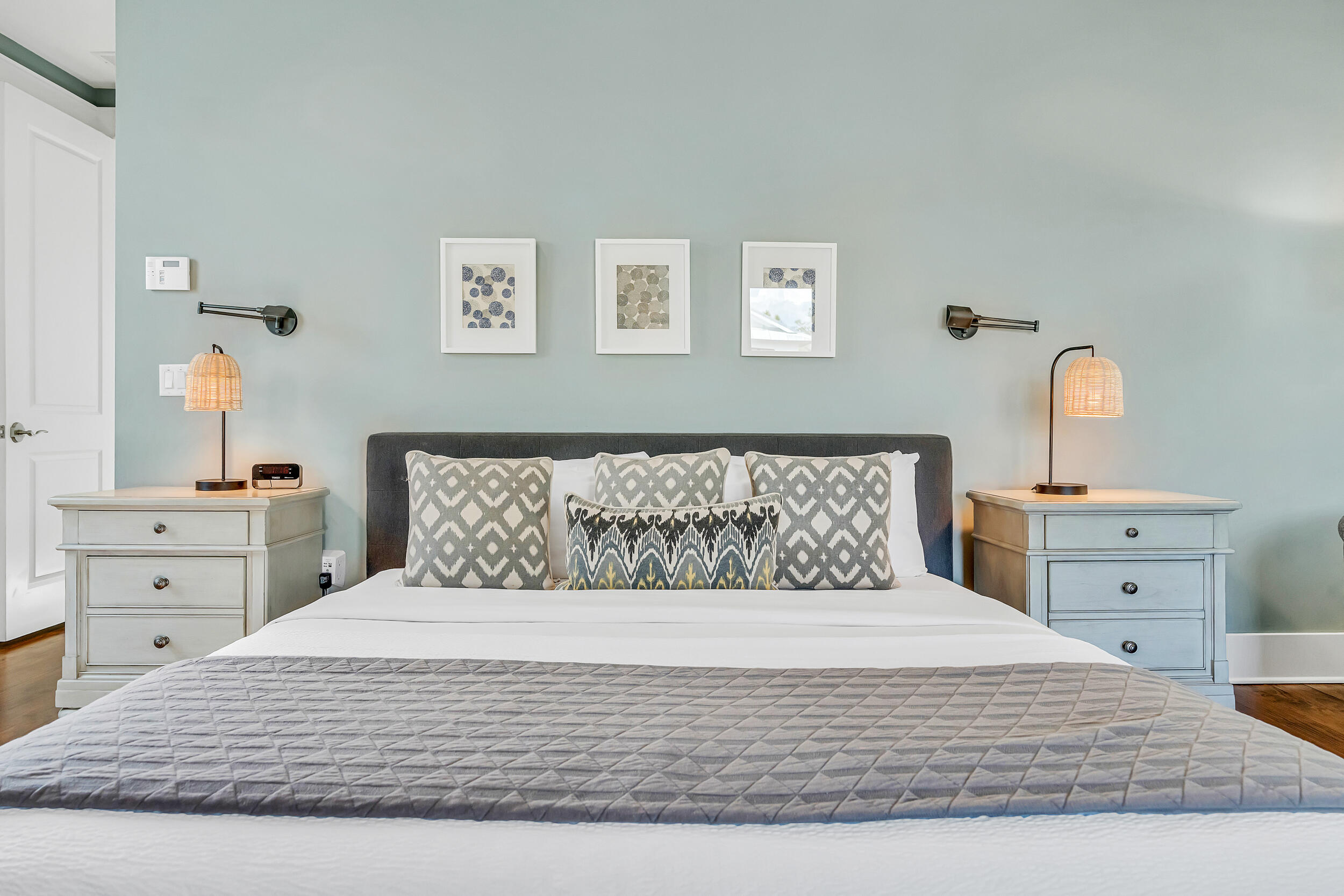 654 Flatwoods Forest Loop Santa Rosa Beach, FL 32459 - Photo 32 of 53 a bedroom with a large bed and a dresser