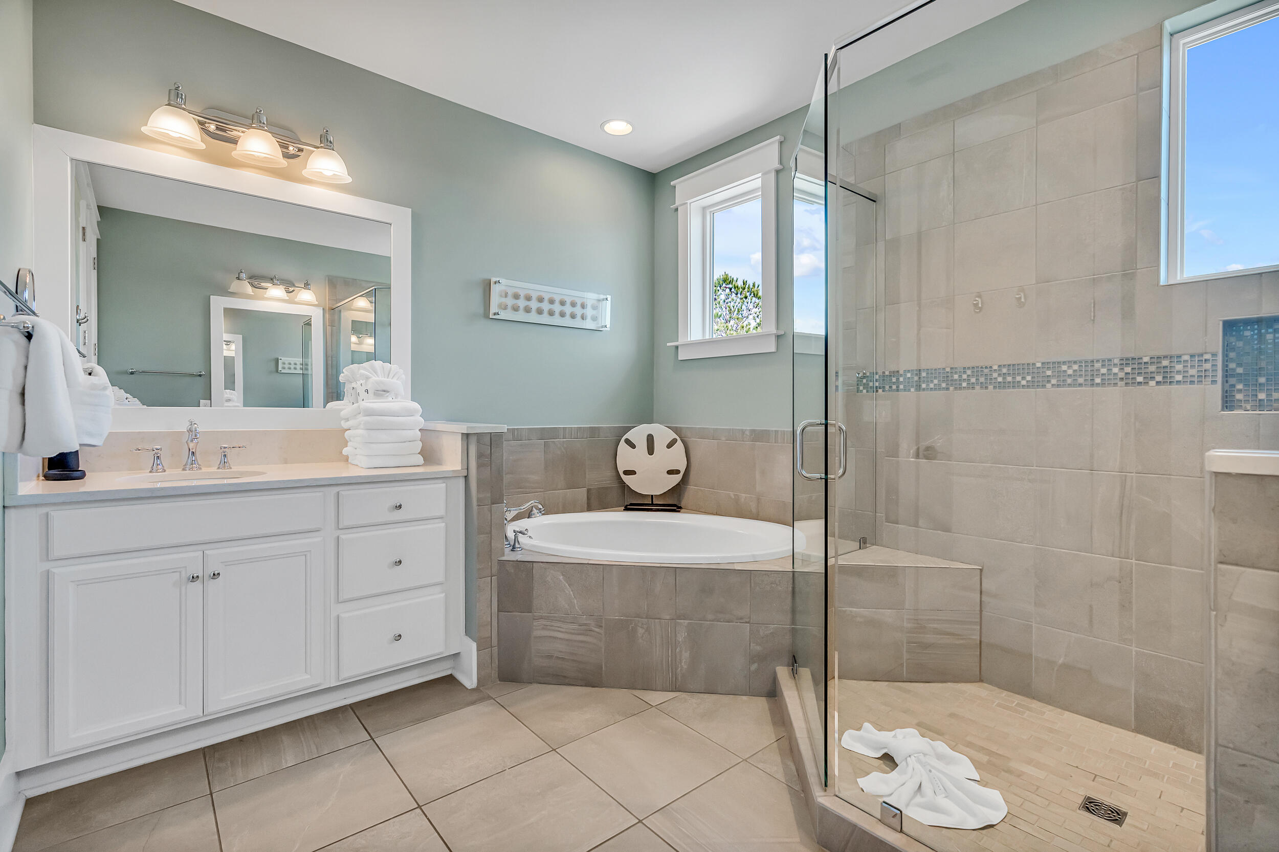 654 Flatwoods Forest Loop Santa Rosa Beach, FL 32459 - Photo 34 of 53 a bathroom with a granite countertop sink a mirror and shower