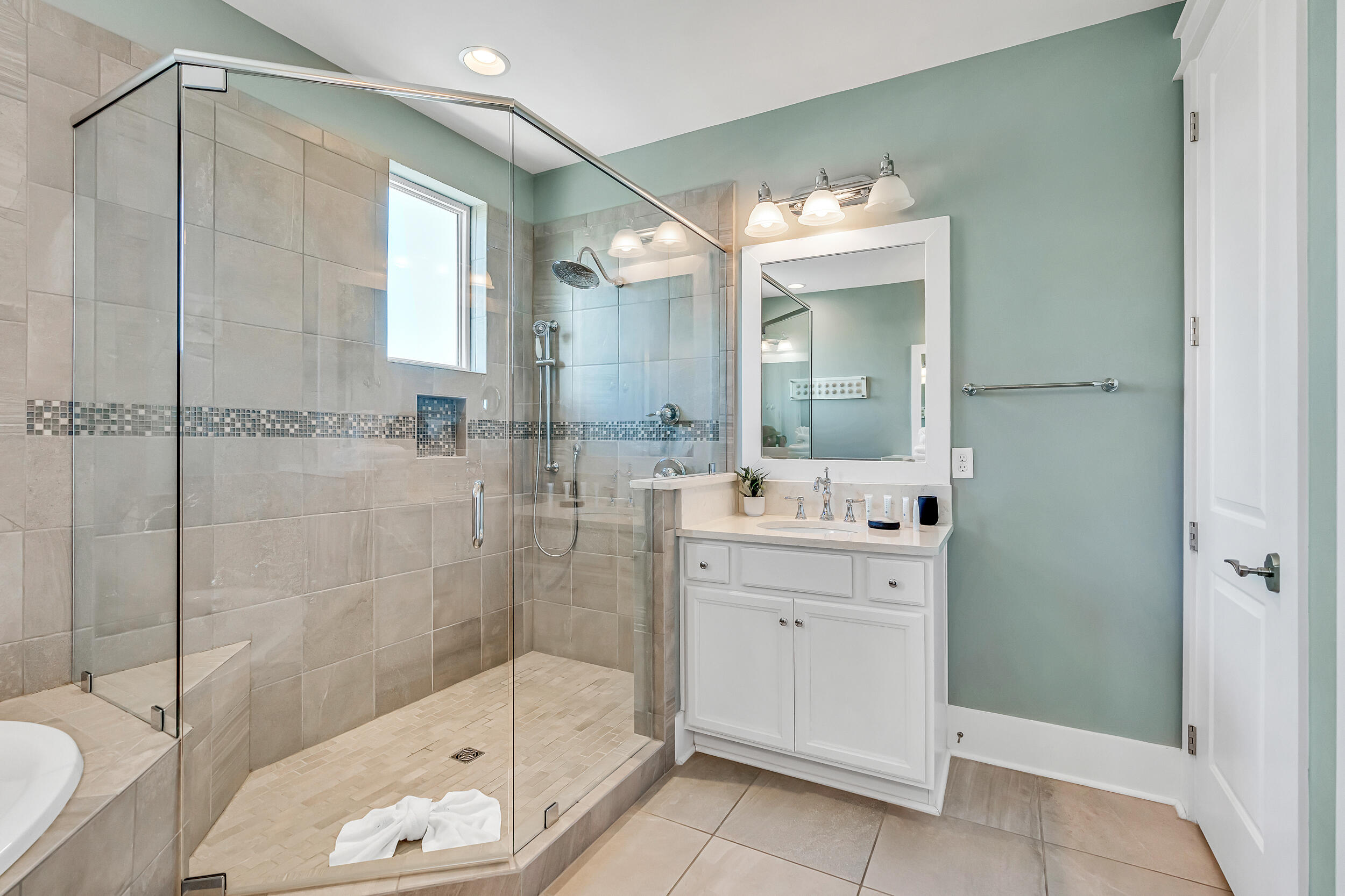 654 Flatwoods Forest Loop Santa Rosa Beach, FL 32459 - Photo 35 of 53 a bathroom with a sink mirror and a shower