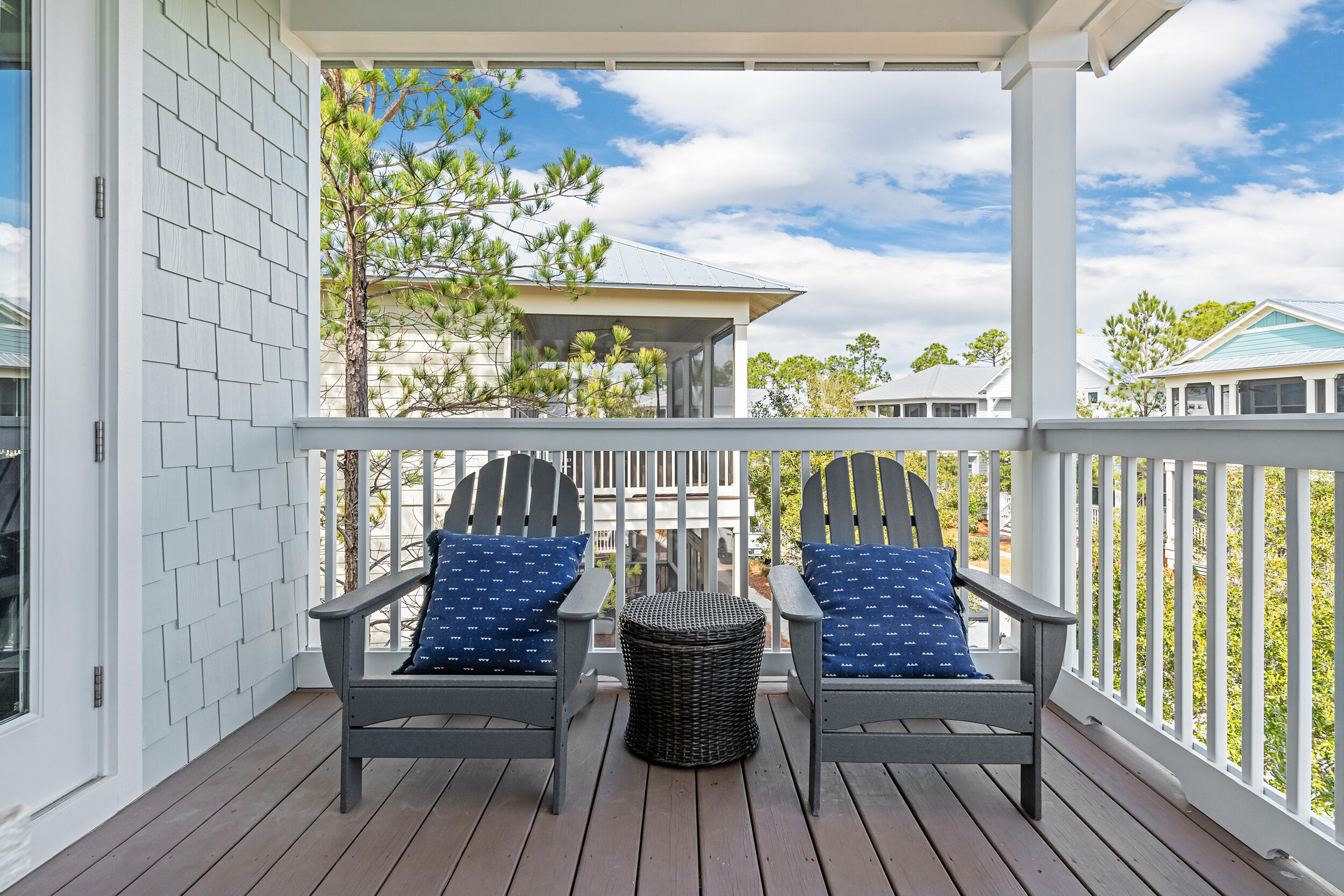 654 Flatwoods Forest Loop Santa Rosa Beach, FL 32459 - Photo 37 of 53 a view of a balcony with wooden floor