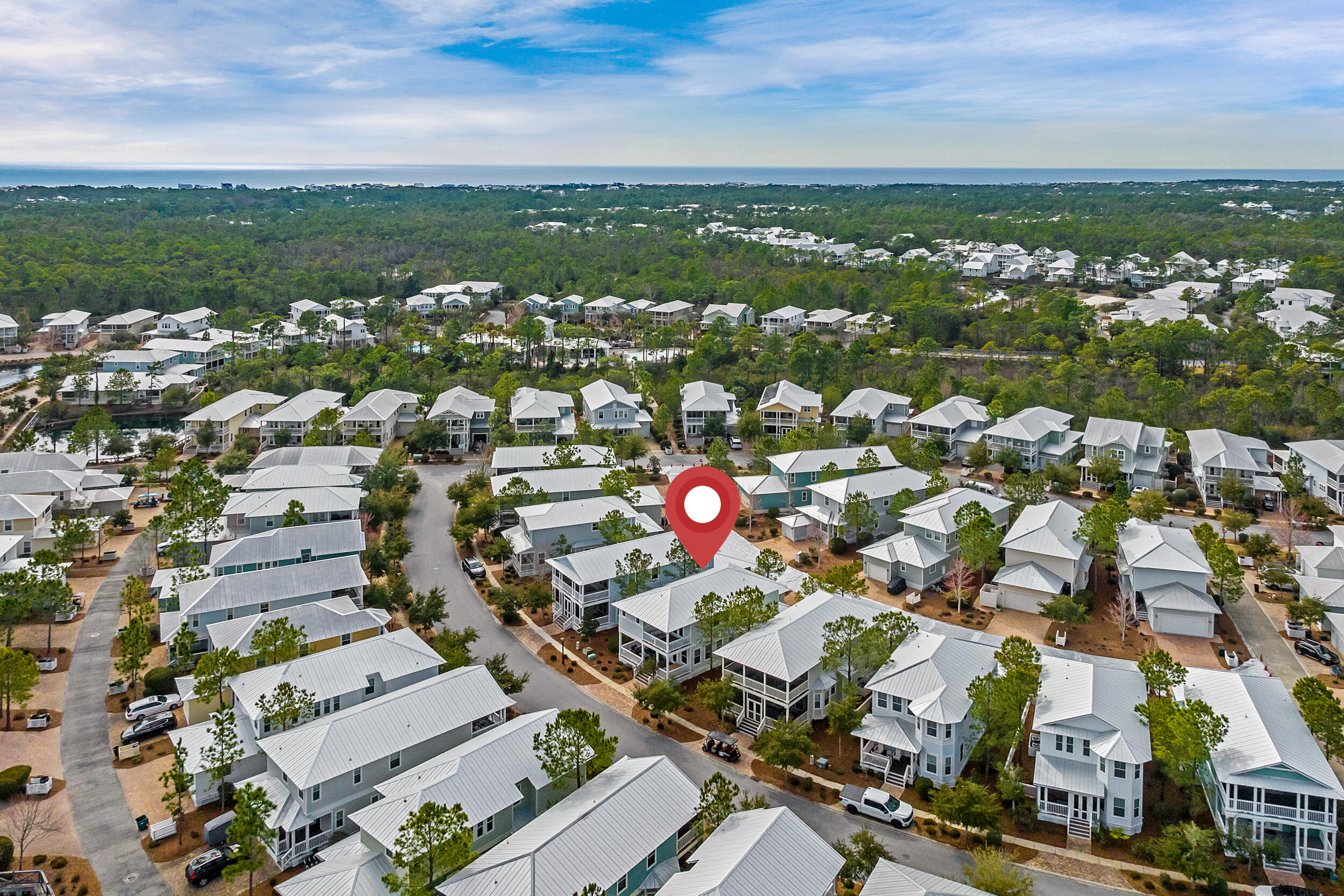 654 Flatwoods Forest Loop Santa Rosa Beach, FL 32459 - Photo 42 of 53 an aerial view of residential houses with outdoor space