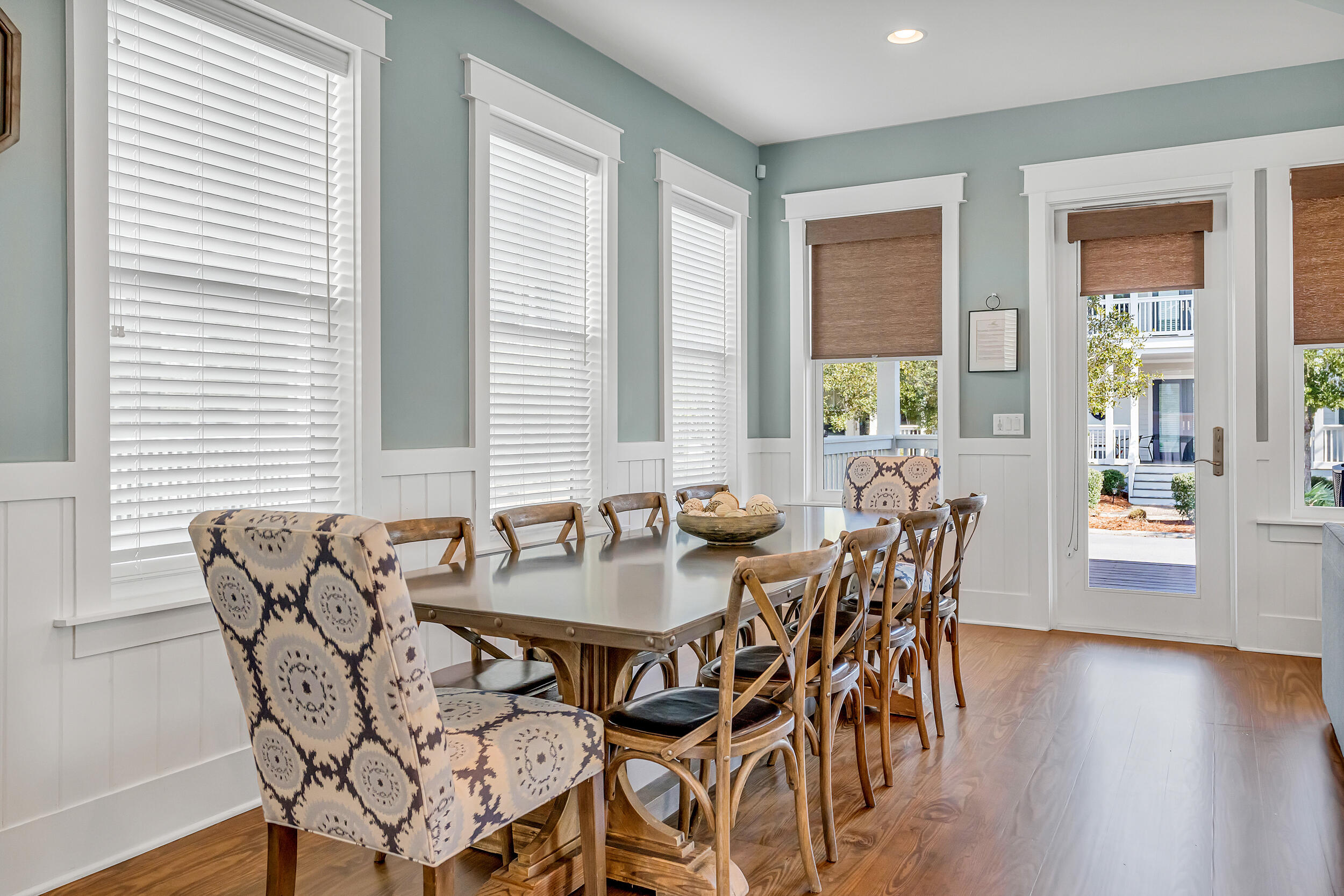 654 Flatwoods Forest Loop Santa Rosa Beach, FL 32459 - Photo 5 of 53 a dining room with furniture and wooden floor