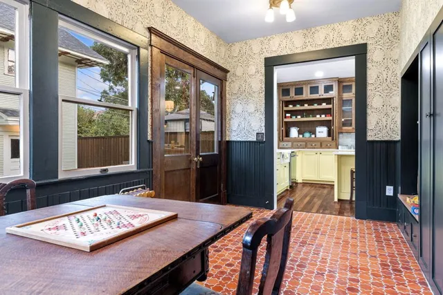 a bathroom with a sink toilet and a mirror