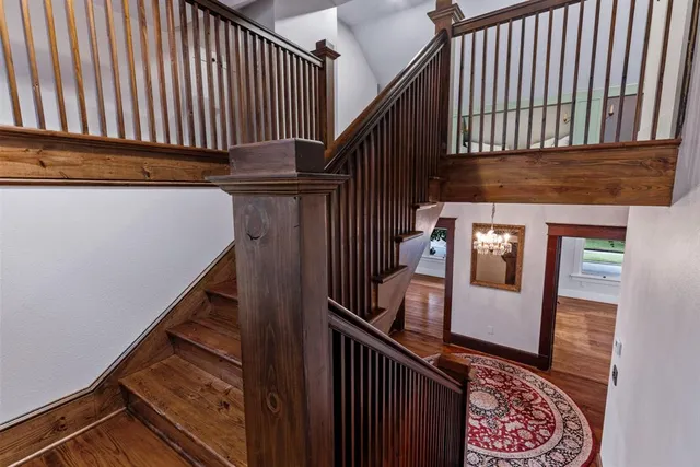 a bathroom with a toilet a sink and a shower