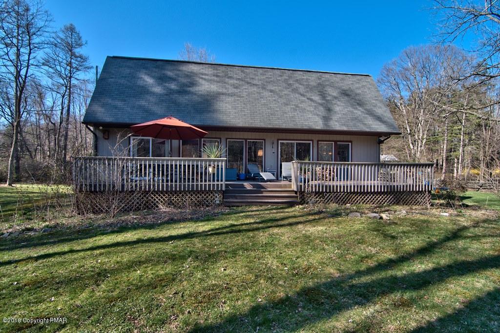 465 Pensyl Creek Road Stroudsburg, PA 18360 - Photo 2 of 80 a view of a house with a yard and furniture