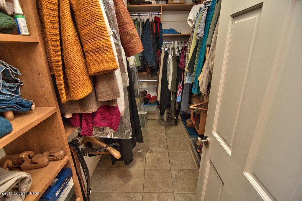 465 Pensyl Creek Road Stroudsburg, PA 18360 - Photo 24 of 80 a view of walk in closet with clothes and shoes