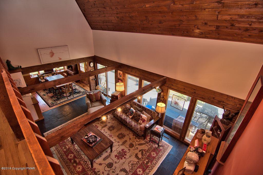 465 Pensyl Creek Road Stroudsburg, PA 18360 - Photo 37 of 80 a view of an chairs and table in the balcony