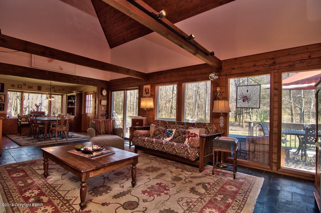 465 Pensyl Creek Road Stroudsburg, PA 18360 - Photo 4 of 80 a living room with furniture and a table