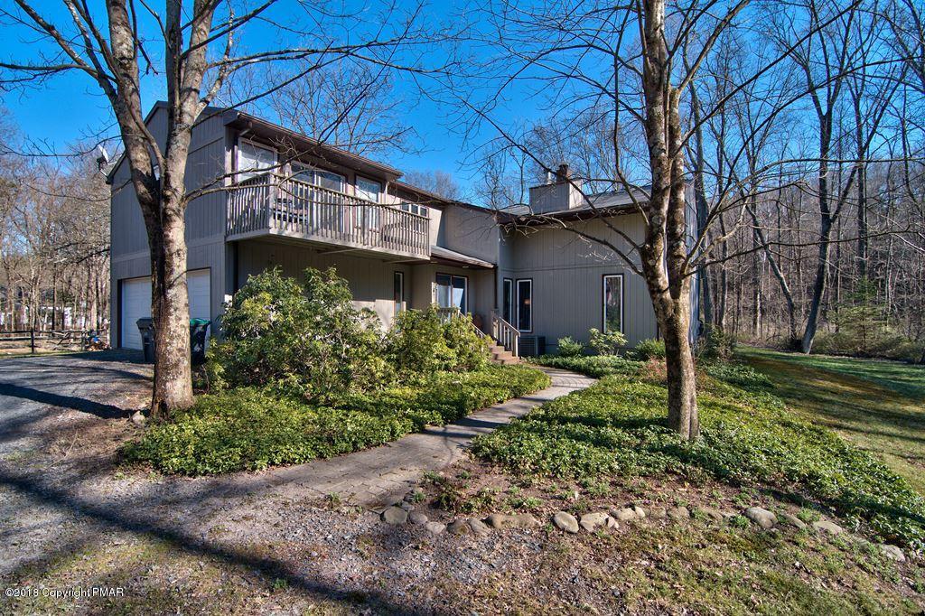 465 Pensyl Creek Road Stroudsburg, PA 18360 - Photo 56 of 80 a front view of a house with garden