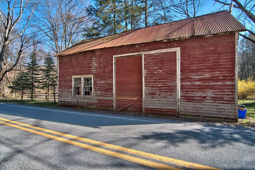 465 Pensyl Creek Road Stroudsburg, PA 18360 - Photo 70 of 80 a front view of a house with a garage